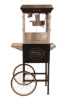 Used Oscar series 8oz popcorn machine with cart - front view