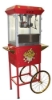 Used red Oscar 8oz popcorn machine with cart - front view