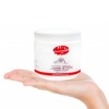 Hand holding Bullseye kettle cleaner jar